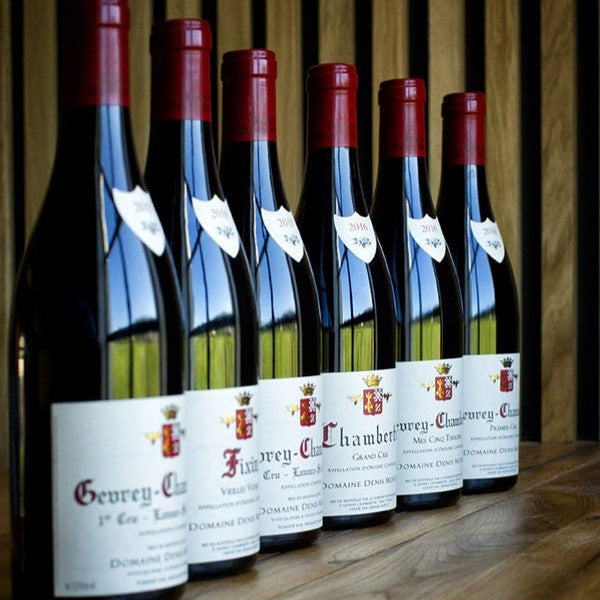 A lineup of some of Domaine Denis Mortet wines