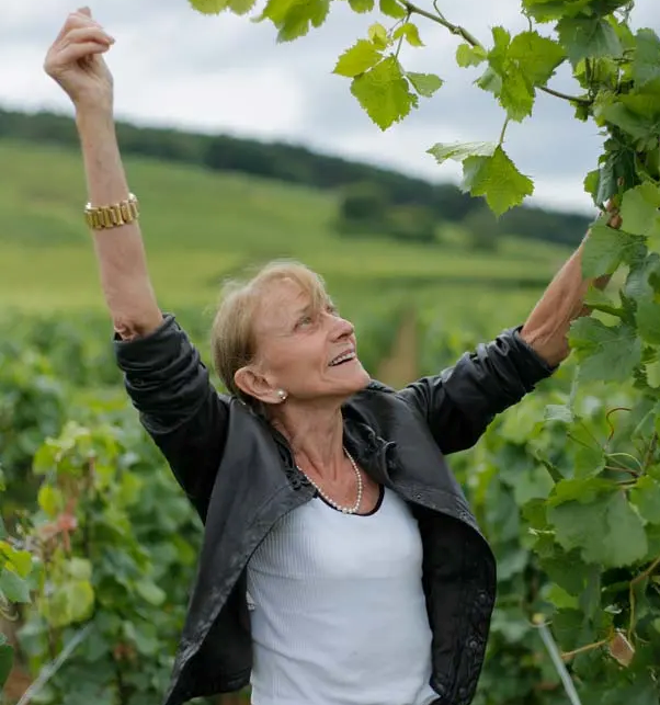 Lalou Bize-Leroy of Domaine Leroy, Maison Leroy, and Domaine d'Auvenay in the vineyard