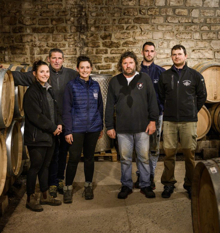 The Ramonet family in their cellar in Chassagne-Montrachet.