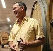 Winemaker, Daniel Ravier, of Domaine Tempier in the cellar with a glass of Rose.