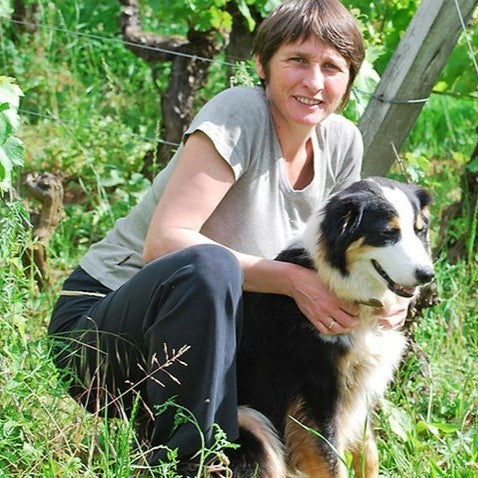 Céline Gormally in the vineyard with her dog